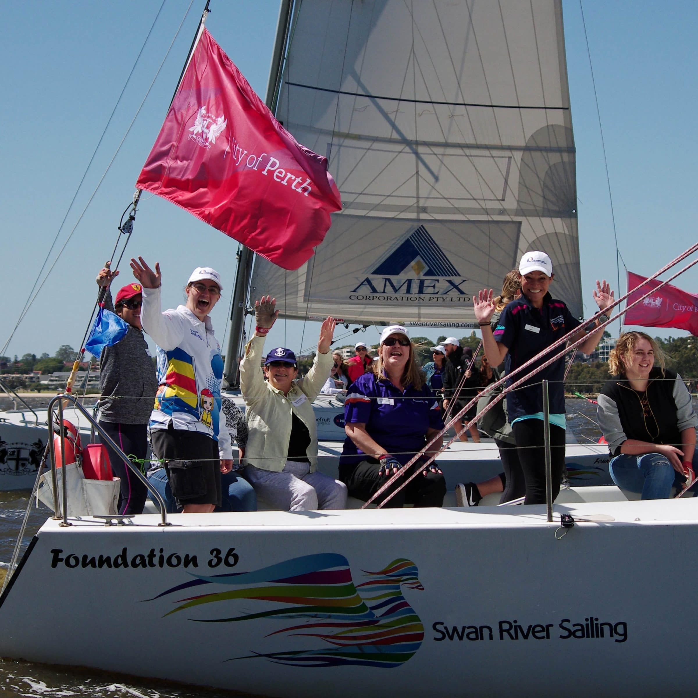 female sailors on a corporate sailing charter in perth with swan river sailing